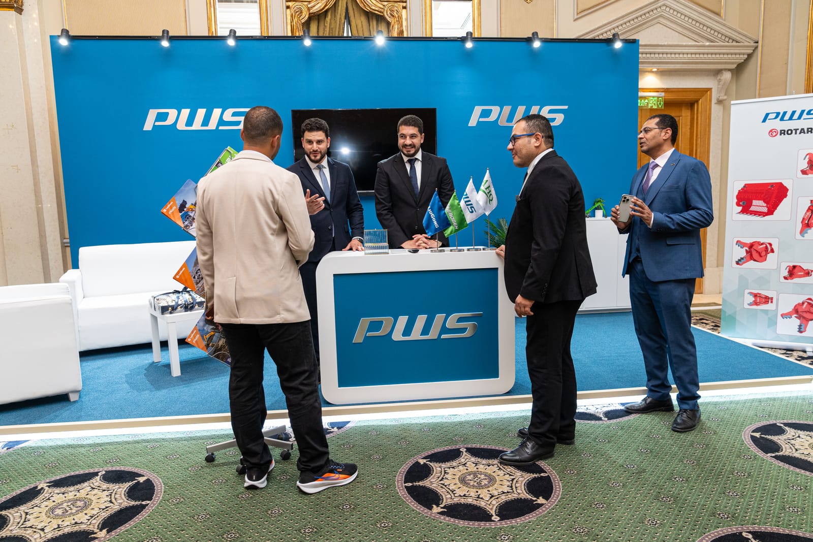 PWS sponsor exhibition booth with attendees