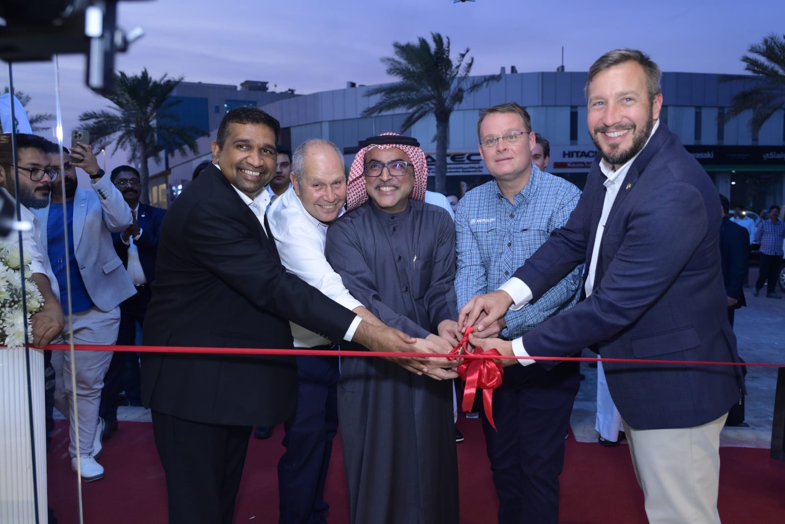 Ribbon cutting ceremony with Mercury Marine executives