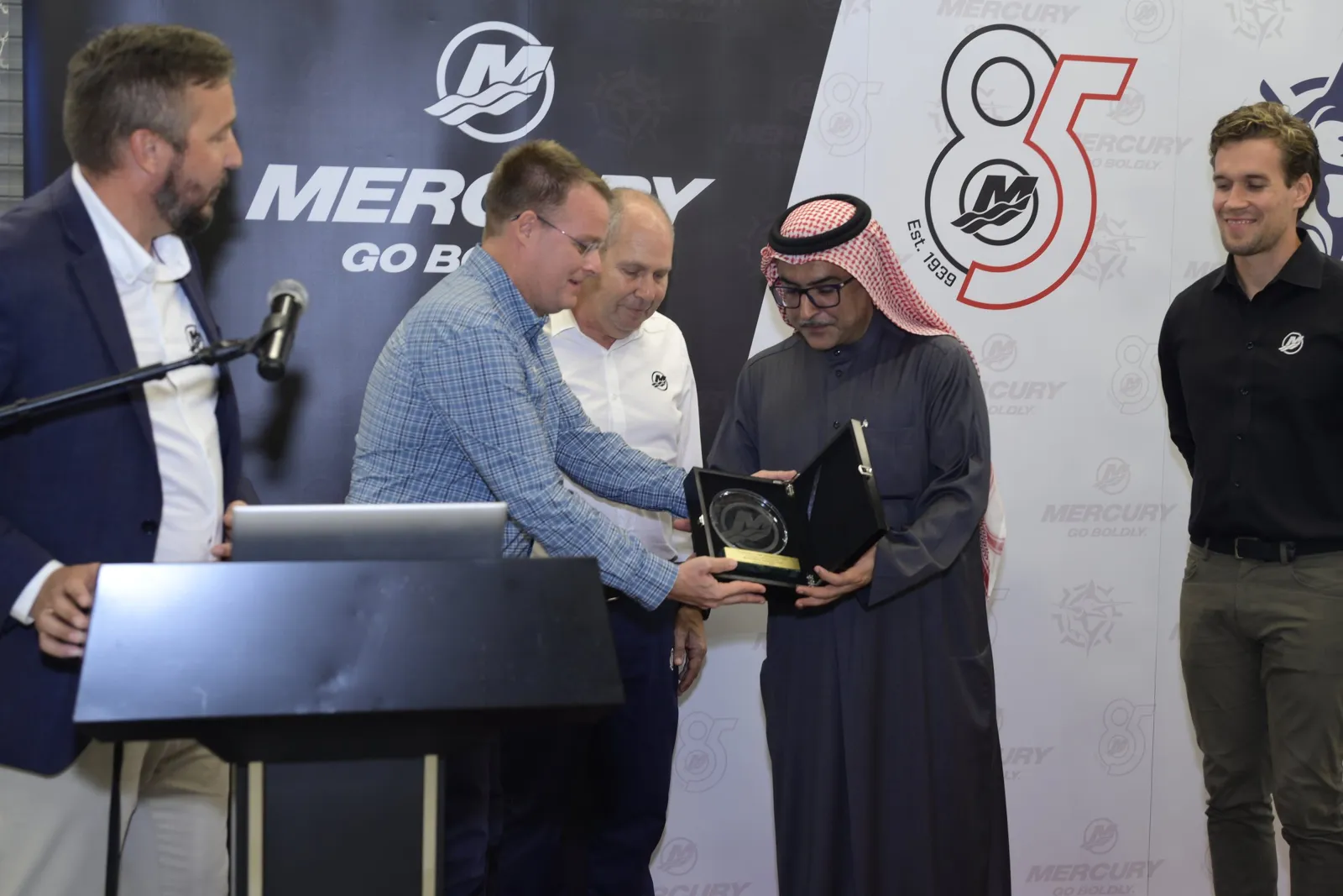 Plaque presentation at Mercury 85 press wall